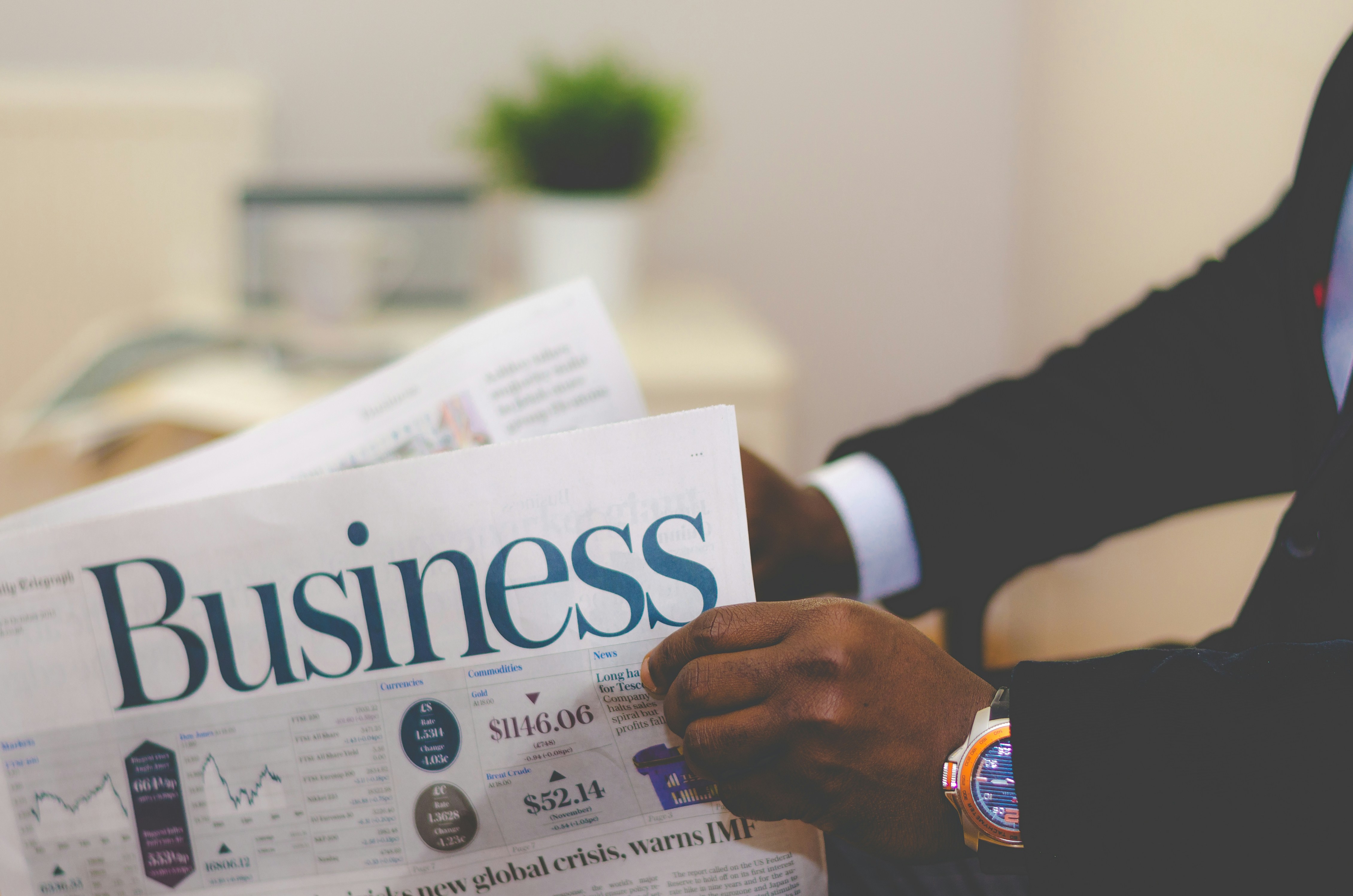 Business leader reviewing customer profitability reports to identify unprofitable accounts