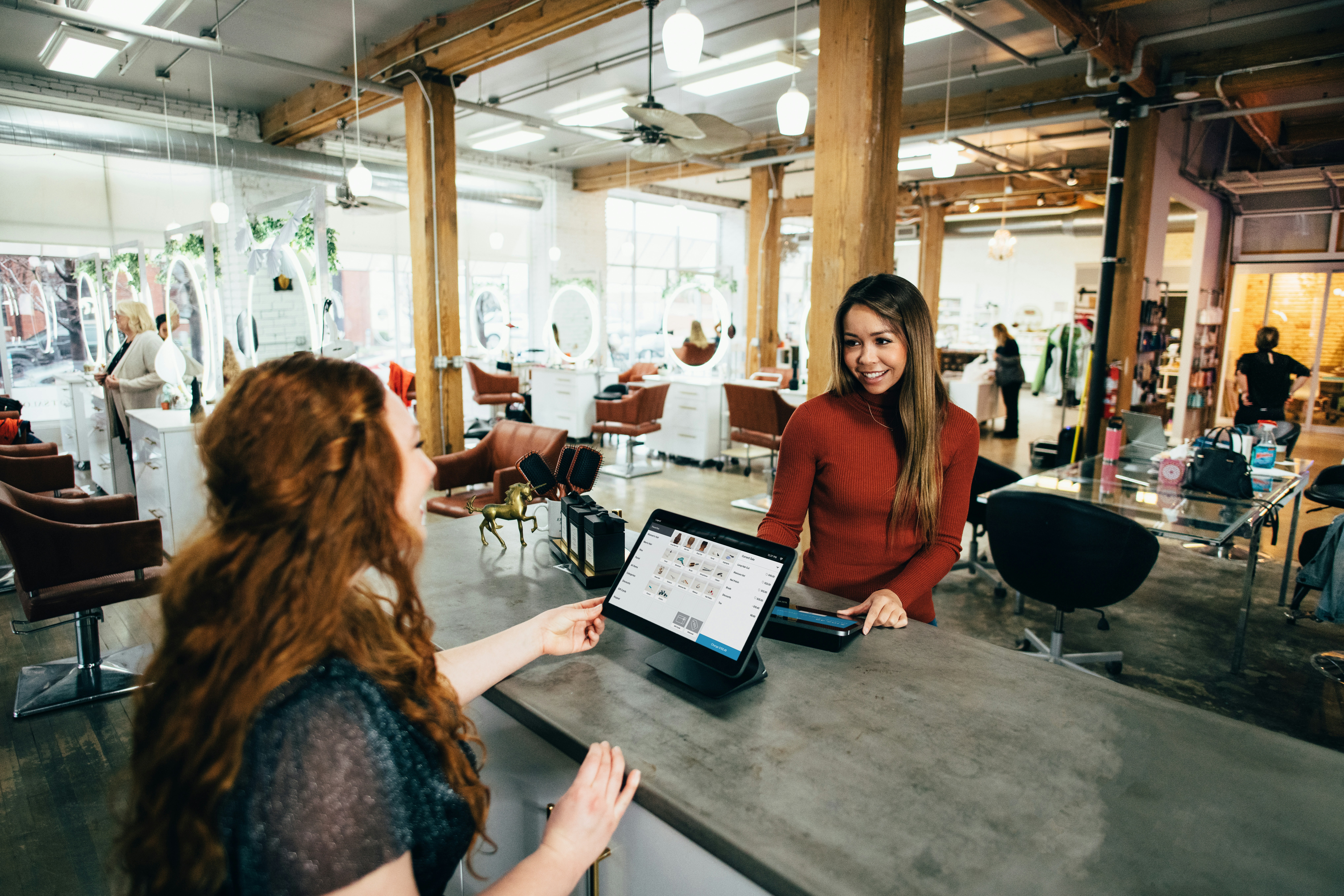 Franchise owner reviewing multiple location reports